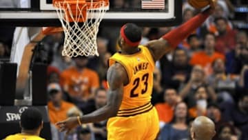 Jan 13, 2015; Phoenix, AZ, USA; Cleveland Cavaliers forward LeBron James (23) dunks the ball during the third quarter against the Phoenix Suns at US Airways Center. Phoenix won 107-100. Mandatory Credit: Casey Sapio-USA TODAY Sports