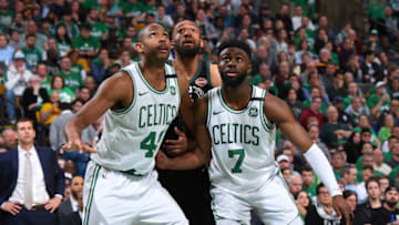 BOSTON, MA - APRIL 24: Al Horford #42 and Jaylen Brown #7 of the Boston Celtics box out during Game Five of Round One of the 2018 NBA Playoffs against the Milwaukee Bucks on April 24, 2018 at the TD Garden in Boston, Massachusetts. NOTE TO USER: User expressly acknowledges and agrees that, by downloading and or using this photograph, User is consenting to the terms and conditions of the Getty Images License Agreement. Mandatory Copyright Notice: Copyright 2018 NBAE (Photo by Brian Babineau/NBAE via Getty Images)