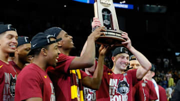 ATLANTA, GA - MARCH 24: The Loyola Ramblers celebrate after defeating the Kansas State Wildcats during the 2018 NCAA Men's Basketball Tournament South Regional at Philips Arena on March 24, 2018 in Atlanta, Georgia. Loyola defeated Kansas State 78-62 to advance to the Final Four. (Photo by Kevin C. Cox/Getty Images)