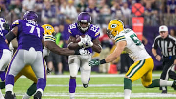Sep 18, 2016; Minneapolis, MN, USA; Minnesota Vikings running back Adrian Peterson (28) carries the ball and is injured on the play during the third quarter against the Green Bay Packers at U.S. Bank Stadium. The Vikings defeated the Packers 17-14. Mandatory Credit: Brace Hemmelgarn-USA TODAY Sports