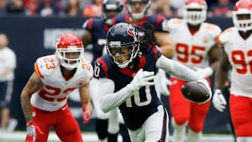 HOUSTON, TX - SEPTEMBER 18: DeAndre Hopkins #10 of the Houston Texans breaks the tackle attempt by Phillip Gaines #23 of the Kansas City Chiefs at NRG Stadium on September 18, 2016 in Houston, Texas. (Photo by Bob Levey/Getty Images)
