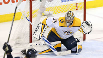 WINNIPEG, MANITOBA - MAY 3: Pekka Rinne #35 of the Nashville Predators makes a save off Mark Scheifele #55 of the Winnipeg Jets in Game Four of the Western Conference Second Round during the 2018 NHL Stanley Cup Playoffs on May 3, 2018 at Bell MTS Place in Winnipeg, Manitoba, Canada. (Photo by Jason Halstead /Getty Images)