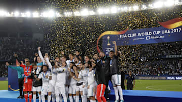 ABU DHABI, UNITED ARAB EMIRATES - DECEMBER 16: Sergio Ramos of Real Madrid lifts the trophy with his team mates at the end of the FIFA Club World Cup UAE 2017 Final match between Real Madrid CF and Gremio FBPA at Zayed Sports City Stadium on December 16, 2017 in Abu Dhabi, United Arab Emirates. (Photo by Angel Martinez/Real Madrid via Getty Images)