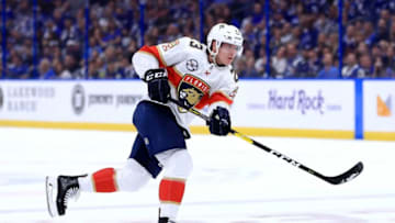 TAMPA, FL - OCTOBER 06: Jacob MacDonald #23 of the Florida Panthers shoots the puck in the first period during Opening Night against the Tampa Bay Lightning at Amalie Arena on October 6, 2018 in Tampa, Florida. (Photo by Mike Ehrmann/Getty Images)