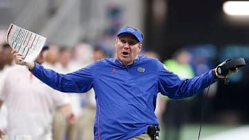 ATLANTA, GEORGIA - DECEMBER 29: Head coach Dan Mullen of the Florida Gators reacts in the fourth quarter against the Michigan Wolverines during the Chick-fil-A Peach Bowl at Mercedes-Benz Stadium on December 29, 2018 in Atlanta, Georgia. (Photo by Mike Zarrilli/Getty Images)