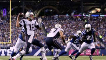 Oct 18, 2015; Indianapolis, IN, USA; New England Patriots quarterback Tom Brady (12) throws a pass in the first half against the Indianapolis Colts during the NFL game at Lucas Oil Stadium. Mandatory Credit: Brian Spurlock-USA TODAY Sports