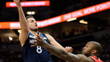 MINNEAPOLIS, MN - APRIL 23: Nemanja Bjelica #8 of the Minnesota Timberwolves shoots the ball against PJ Tucker #4 of the Houston Rockets in Game Four of Round One of the 2018 NBA Playoffs on April 23, 2018 at the Target Center in Minneapolis, Minnesota. The Rockets defeated the Timberwolves 119-100. NOTE TO USER: User expressly acknowledges and agrees that, by downloading and or using this Photograph, user is consenting to the terms and conditions of the Getty Images License Agreement. (Photo by Hannah Foslien/Getty Images)