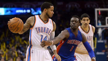 Nov 27, 2015; Oklahoma City, OK, USA; Detroit Pistons guard Reggie Jackson (1) guards Oklahoma City Thunder guard D.J. Augustin (14) during the fourth quarter at Chesapeake Energy Arena. Mandatory Credit: Mark D. Smith-USA TODAY Sports