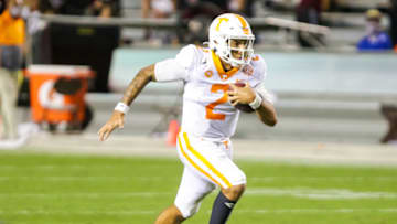 Sep 26, 2020; Columbia, South Carolina, USA; Tennessee Volunteers quarterback Jarrett Guarantano (2) runs against the South Carolina Gamecocks at Williams-Brice Stadium. Mandatory Credit: Jeff Blake-USA TODAY Sports
