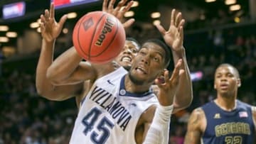 Nov 27, 2015; Brooklyn, NY, USA; Villanova Wildcats forward Darryl Reynolds (45) reaches for a rebound in the Championship game against the Georgia Tech Yellow Jackets at Barclays Center. Villanova won, 69-52. Mandatory Credit: Vincent Carchietta-USA TODAY Sports