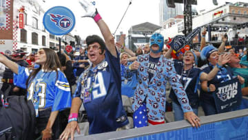 NASHVILLE, TENNESSEE - APRIL 25: Fans of the Tennessee Titans attend Day 1 of the 2019 NFL Draft on April 25, 2019 in Nashville, Tennessee. (Photo by Frederick Breedon/Getty Images)
