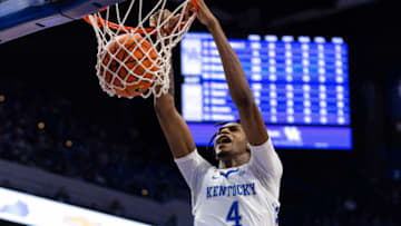 Nov 12, 2021; Lexington, Kentucky, USA; Kentucky Wildcats forward Daimion Collins (4) dunks the ball during the second half against the Robert Morris Colonials at Rupp Arena at Central Bank Center. Mandatory Credit: Jordan Prather-USA TODAY Sports