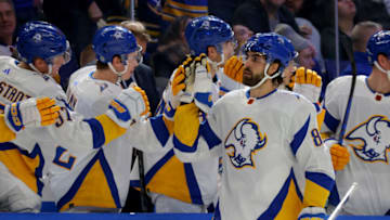 Feb 1, 2023; Buffalo, New York, USA; Buffalo Sabres right wing Alex Tuch (89) celebrates his goal with teammates during the first period against the Carolina Hurricanes at KeyBank Center. Mandatory Credit: Timothy T. Ludwig-USA TODAY Sports