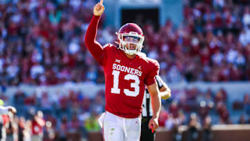 Oct 30, 2021; Norman, Oklahoma, USA; Oklahoma Sooners quarterback Caleb Williams (13) celebrates after throwing a touchdown pass during the first quarter against the Texas Tech Red Raiders at Gaylord Family-Oklahoma Memorial Stadium. Mandatory Credit: Kevin Jairaj-USA TODAY Sports