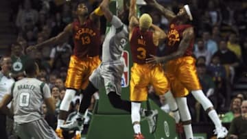 Jan 13, 2016; Boston, MA, USA; Indiana Pacers forward Paul George (13) guard George Hill (3) and center Jordan Hill (27) try to block the shot of Boston Celtics guard Marcus Smart (36) during the second half at TD Garden. Mandatory Credit: Bob DeChiara-USA TODAY Sports
