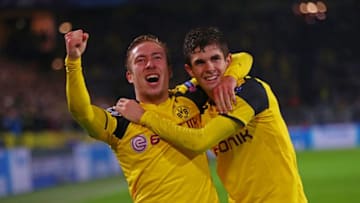 DORTMUND, GERMANY - NOVEMBER 22: Felix Passlack of Borussia Dortmund celebrates scoring his teams seventh goal with teammate Christian Pulisic during the UEFA Champions League Group F match between Borussia Dortmund and Legia Warszawa at Signal Iduna Park on November 22, 2016 in Dortmund, North Rhine-Westphalia. (Photo by Alex Grimm/Bongarts/Getty Images)