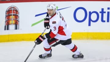 Mar 5, 2014; Calgary, Alberta, CAN; Ottawa Senators defenseman Marc Methot (3) skates with the puck against the Calgary Flames during the first period at Scotiabank Saddledome. Calgary Flames won 4-1. Mandatory Credit: Sergei Belski-USA TODAY Sports