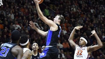 Dec 31, 2016; Blacksburg, VA, USA; Duke Blue Devils guard Luke Kennard (5) shoots against the Virginia Tech Hokies in the first half at Cassell Coliseum. Mandatory Credit: Michael Shroyer-USA TODAY Sports