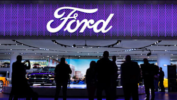 DETROIT, MI-JANUARY 15: Members of the news media stand around the entrance to the Ford Motor Company exhibit at the 2018 North American International Auto Show January 15, 2018 in Detroit, Michigan. More than 5,100 journalists from 61 countries attend the NAIAS each year. The show opens to the public January 20th and ends January 28th. (Photo by Bill Pugliano/Getty Images)