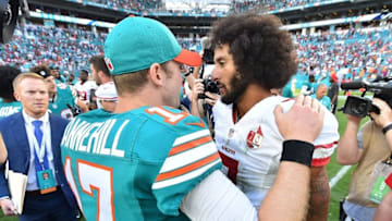 Nov 27, 2016; Miami Gardens, FL, USA; Miami Dolphins quarterback Ryan Tannehill (17) and San Francisco 49ers quarterback Colin Kaepernick (7) shake hands after the game at Hard Rock Stadium. The Miami Dolphins defeat the San Francisco 49ers 31-24. Mandatory Credit: Jasen Vinlove-USA TODAY Sports