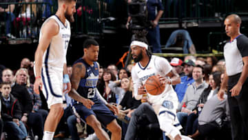 DALLAS, TX - MARCH 2: Mike Conley #11 of the Memphis Grizzlies handles the ball during the game against the Dallas Mavericks on March 2, 2019 at the American Airlines Center in Dallas, Texas. NOTE TO USER: User expressly acknowledges and agrees that, by downloading and or using this photograph, User is consenting to the terms and conditions of the Getty Images License Agreement. Mandatory Copyright Notice: Copyright 2019 NBAE (Photo by Glenn James/NBAE via Getty Images)