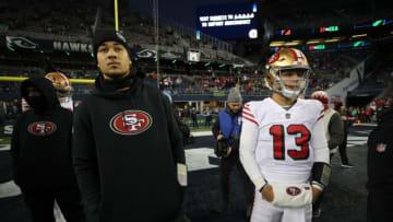 NFL trade rumors: Trey Lance #5 and Brock Purdy #13 of the San Francisco 49ers on the field before the game against the Seattle Seahawks at Lumen Field on December 15, 2022 in Seattle, Washington. The 49ers defeated the Seahawks 21-13. (Photo by Michael Zagaris/San Francisco 49ers/Getty Images)
