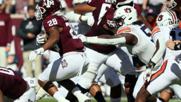 Auburn footballCOLLEGE STATION, TEXAS - NOVEMBER 06: Isaiah Spiller #28 of the Texas A&M Aggies runs with the ball against the Auburn Tigers in the first quarter at Kyle Field on November 06, 2021 in College Station, Texas. (Photo by Bob Levey/Getty Images)