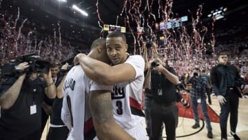 Apr 25, 2016; Portland, OR, USA; Portland Trail Blazers guard Damian Lillard (0) celebrates with teammates after a 98-84 win over Los Angeles Clippers in game four of the first round of the NBA Playoffs at Moda Center at the Rose Quarter. Mandatory Credit: Jaime Valdez-USA TODAY Sports