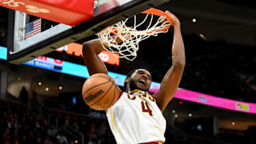 CLEVELAND, OHIO - MARCH 06: Evan Mobley #4 of the Cleveland Cavaliers dunks during the third quarter against the Toronto Raptors at Rocket Mortgage Fieldhouse on March 06, 2022 in Cleveland, Ohio. The Cavaliers defeated the Raptors 104-96. NOTE TO USER: User expressly acknowledges and agrees that, by downloading and/or using this photograph, user is consenting to the terms and conditions of the Getty Images License Agreement. (Photo by Jason Miller/Getty Images)