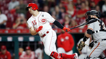 CINCINNATI, OH - MAY 03: Nick Senzel #15 of the Cincinnati Reds hits an infield single for his first Major League hit in the ninth inning against the San Francisco Giants at Great American Ball Park on May 3, 2019 in Cincinnati, Ohio. The Giants won 12-11 in 11 innings. (Photo by Joe Robbins/Getty Images)