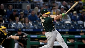 PITTSBURGH, PA - MAY 03: Josh Phegley #19 of the Oakland Athletics hits a three run RBI double to left field in the second inning during the game against the Pittsburgh Pirates at PNC Park on May 3, 2019 in Pittsburgh, Pennsylvania. (Photo by Justin Berl/Getty Images)