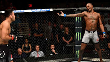 LAS VEGAS, NV - JULY 06: (R-L) Israel Adesanya of Nigeria taunts Brad Tavares in their middleweight bout during The Ultimate Fighter Finale event inside The Pearl concert theater at Palms Casino Resort on July 6, 2018 in Las Vegas, Nevada. (Photo by Jeff Bottari/Zuffa LLC/Zuffa LLC via Getty Images)