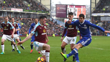 BURNLEY, ENGLAND - FEBRUARY 12: Marcos Alonso of Chelsea takes a shot on goal as Michael Keane of Burnley blocks during the Premier League match between Burnley and Chelsea at Turf Moor on February 12, 2017 in Burnley, England. (Photo by Mike Hewitt/Getty Images)