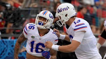 JACKSONVILLE, FL - OCTOBER 27: Freddie Swain #16 and Feleipe Franks #13 of the Florida Gators celebrates a touchdown during a game against the Georgia Bulldogs at TIAA Bank Field on October 27, 2018 in Jacksonville, Florida. (Photo by Mike Ehrmann/Getty Images)
