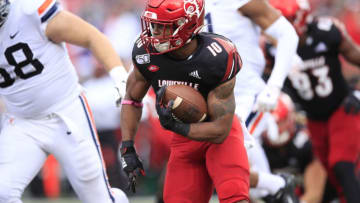 LOUISVILLE, KENTUCKY - OCTOBER 26: Javian Hawkins #10 of the Louisville Cardinals runs with the ball against the Virginia Cavaliers on October 26, 2019 in Louisville, Kentucky. (Photo by Andy Lyons/Getty Images)