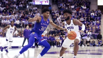Mar 1, 2022; Fort Worth, Texas, USA; TCU Horned Frogs guard Mike Miles (1) looks to drive as Kansas Jayhawks guard Ochai Agbaji (30) defends during the first half at Ed and Rae Schollmaier Arena. Mandatory Credit: Kevin Jairaj-USA TODAY Sports