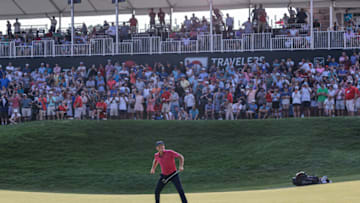 Jun 27, 2021; Cromwell, Connecticut, USA; Kramer Hickok reacts after making a birdie putt to force a playoff with Harris English (not pictured) during the final round of the Travelers Championship golf tournament. Mandatory Credit: Vincent Carchietta-USA TODAY Sports
