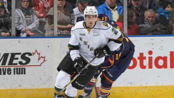 LONDON, ON - NOVEMBER 25: Evan Bouchard #2 of the London Knights skates away with the puck against the Barrie Colts during an OHL game at Budweiser Gardens on November 25, 2016 in London, Ontario, Canada. The Knights defeated the Colts 4-1. (Photo by Claus Andersen/Getty Images)