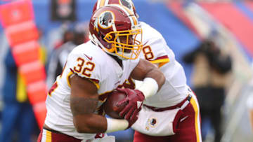 EAST RUTHERFORD, NJ - DECEMBER 31: Samaje Perine #32 of the Washington Redskins runs with the ball during the first half of their game against the New York Giants at MetLife Stadium on December 31, 2017 in East Rutherford, New Jersey. (Photo by Ed Mulholland/Getty Images)