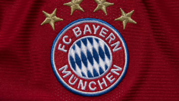 MANCHESTER, ENGLAND - AUGUST 17: The FC Bayern Munich club crest on their home shirt displaying the four stars commemorating their Bundesliga successes on August 17, 2020 in Manchester, United Kingdom. (Photo by Visionhaus)