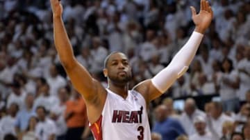 May 26, 2014; Miami, FL, USA; Miami Heat guard Dwyane Wade (3) tries to get the crowd involved against the Indiana Pacers in game four of the Eastern Conference Finals of the 2014 NBA Playoffs at American Airlines Arena. Mandatory Credit: Steve Mitchell-USA TODAY Sports
