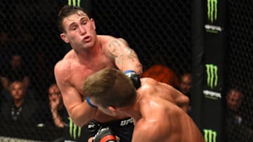 LIVERPOOL, ENGLAND - MAY 27: (L-R) Darren Till of England punches Stephen Thompson in their welterweight bout during the UFC Fight Night event at ECHO Arena on May 27, 2018 in Liverpool, England. (Photo by Josh Hedges/Zuffa LLC/Zuffa LLC via Getty Images)