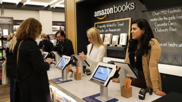 NEW YORK, NY - MAY 25: People shop in the newly opened Amazon Books on May 25, 2017 in New York City. Amazon.com Inc.'s first New York City bookstore occupies 4,000 square feet in The Shops at Columbus Circle in Manhattan and stocks upwards of 3,000 books. Amazon Books, like the Amazon Go store, does not accept cash and instead lets Prime members use the Amazon app on their smartphone to pay for purchases. Non-members can use a credit or debit card. (Photo by Spencer Platt/Getty Images)