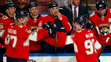 SUNRISE, FL - OCTOBER 7: Jared McCann #90 of the Florida Panthers celebrates his goal with teammate Nick Bjugstad #27 against the Tampa Bay Lightning at the BB&T Center on October 7, 2017 in Sunrise, Florida. (Photo by Eliot J. Schechter/NHLI via Getty Images)