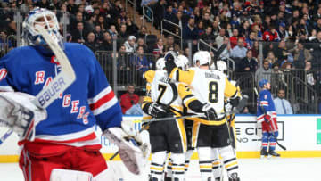 NEW YORK, NY - JANUARY 02: Members of the Pittsburgh Penguins celebrate after a goal in the second period against Henrik Lundqvist #30 of the New York Rangers at Madison Square Garden on January 2, 2019 in New York City. (Photo by Jared Silber/NHLI via Getty Images)