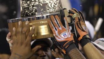 The Bears hoist the George S. Halas trophy after winning the 2007 NFC Championship game between the Chicago Bears and New Orleans Saints at Soldier Field in Chicago, Illinois on January 21, 2007. (Photo by Al Messerschmidt/Getty Images)