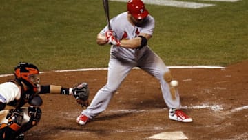 Oct 15, 2014; San Francisco, CA, USA; St. Louis Cardinals left fielder Matt Holliday (7) takes a called strike to end game four of the 2014 NLCS playoff baseball game against the San Francisco Giants at AT&T Park. Mandatory Credit: Kelley L Cox-USA TODAY Sports