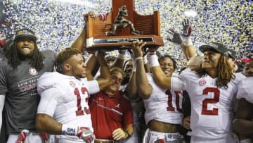 Dec 3, 2016; Atlanta, GA, USA; Alabama Crimson Tide head coach Nick Saban celebrates winning the trophy with his team after the SEC Championship college football game against the Florida Gators at Georgia Dome. Alabama defeated Florida 54-16. Mandatory Credit: Jason Getz-USA TODAY Sports