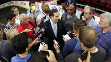 Sep 29, 2014; Philadelphia, PA, USA; Philadelphia 76ers general manager Sam Hinkie talks with reporters during media day at the Wells Fargo Center. Mandatory Credit: Bill Streicher-USA TODAY Sports
