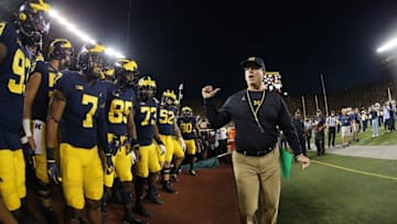 ANN ARBOR, MI - OCTOBER 07: Michigan head football coach Jim Harbaugh watches the warms ups prior to the start of the game against the Michigan State Spartans at Michigan Stadium on October 7, 2017 in Ann Arbor, Michigan. Michigan State defeated Michigan 14-10. (Photo by Leon Halip/Getty Images)